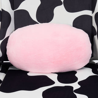 Close up of the original cow gaming chair with an emphasis on the fluffy pink lumbar pillow. 